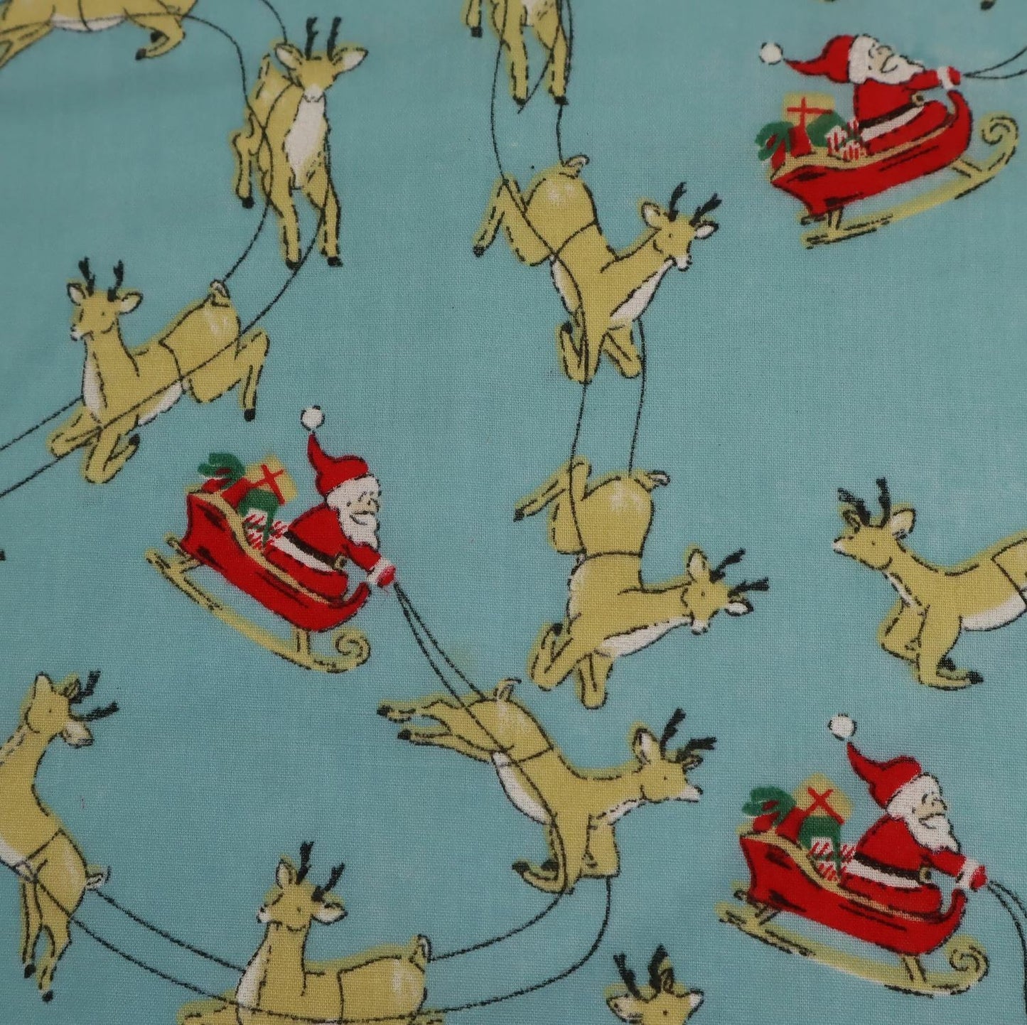 Christmas Santa Sleigh Polycotton Floral Fabric - Sky