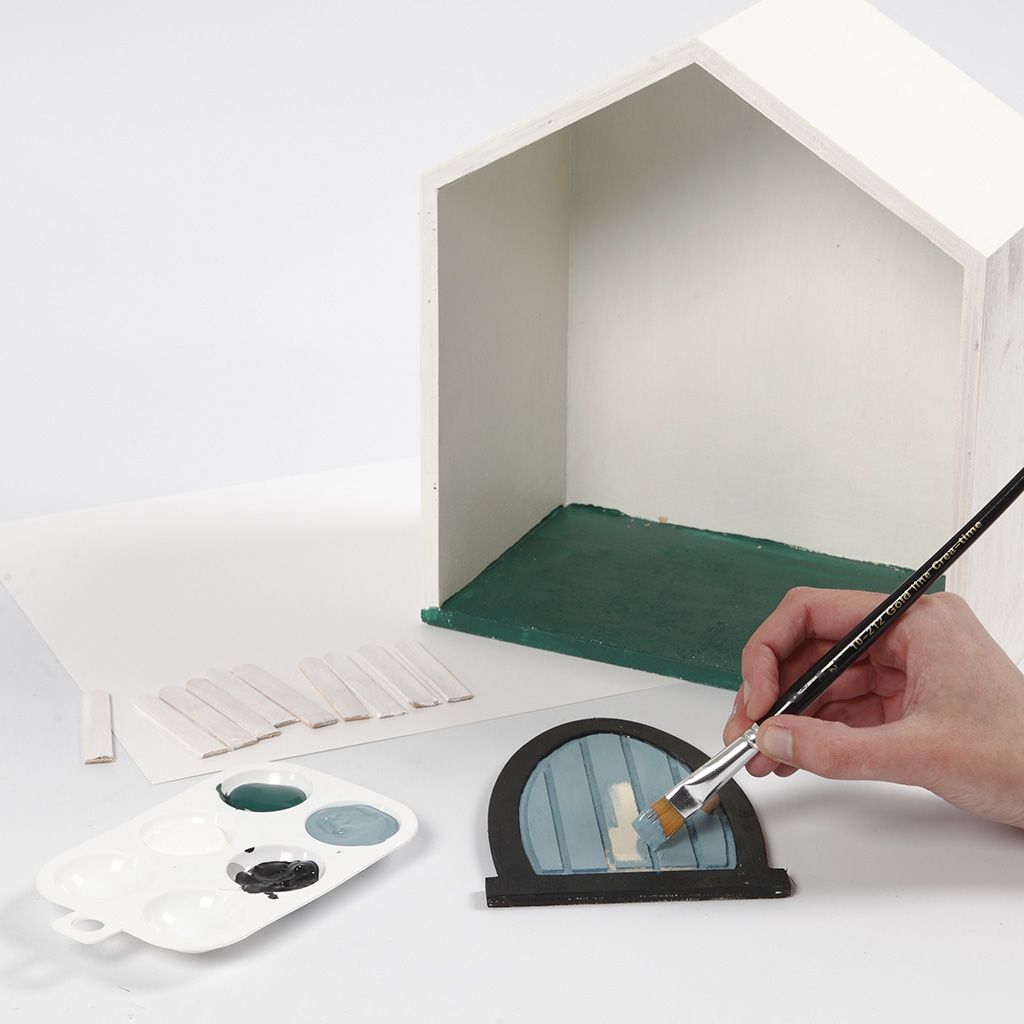 A Small Fairy House in a Storage Box