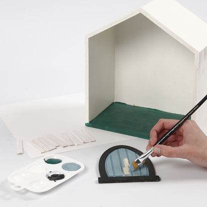 A Small Fairy House in a Storage Box